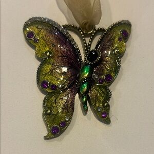 Elegant Butterfly Ornament with Purple and Green Accents